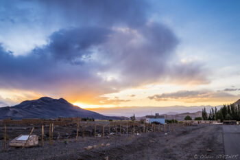 El Piñon Sunset view of mountains and sky in San Pedro de Atacama, with dramatic clouds and vibrant colors.