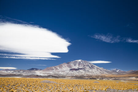 Stunning image of Fiambala in Argentina showcasing mountains, desert, and clear blue sky. Scenic view of Fiambala's mountain range and desert landscape in Argentina.