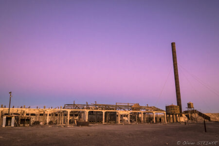 Oficina Chacabuco Desert landscape in Fiambala, Argentina with colorful sky at sunset.